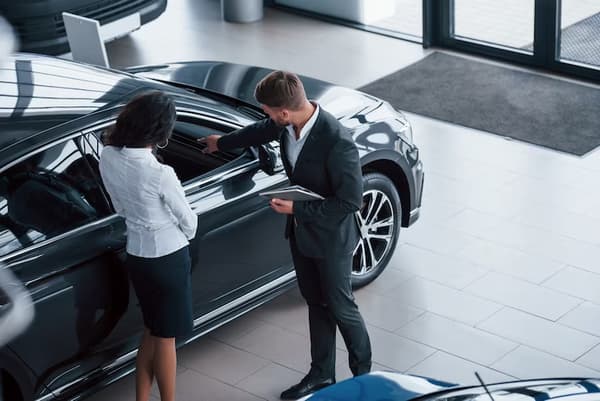 looking-vehicle-interior-female-customer-modern-stylish-bearded-businessman-automobile-saloon_146671-16013.avif